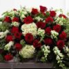 Red and Green Casket Spray